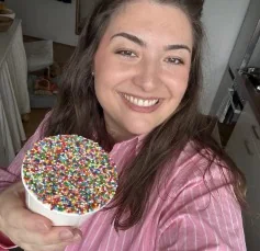 Kimberly with a dot cake