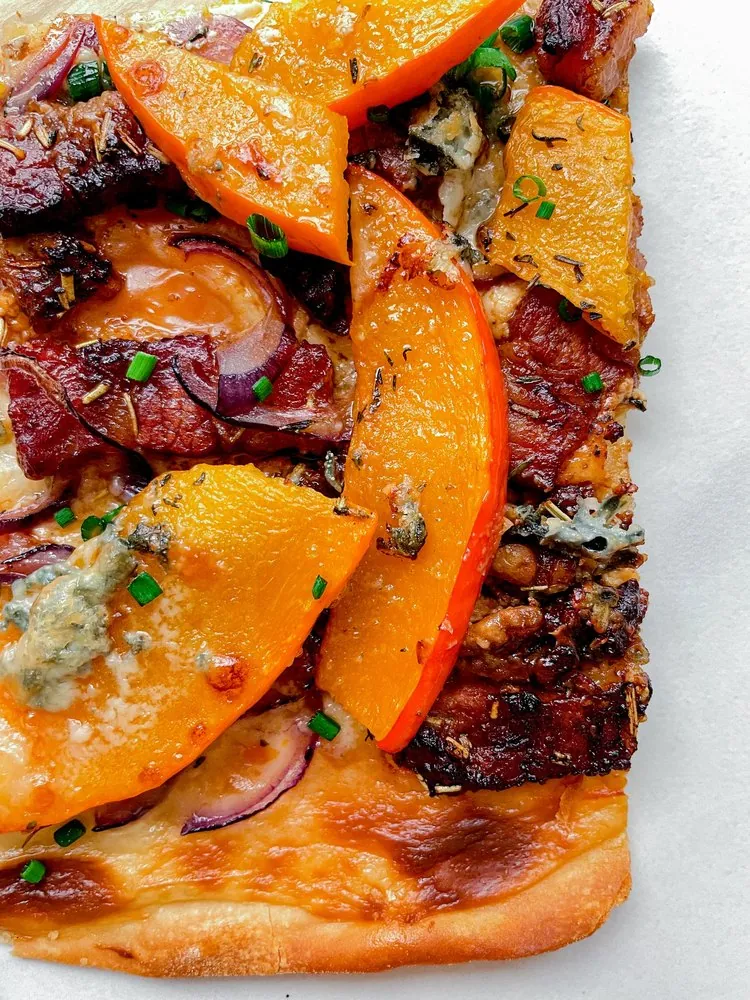 Pumpkin Tart Flambé with Bacon Walnuts Gorgonzola & Lamb’s Lettuce