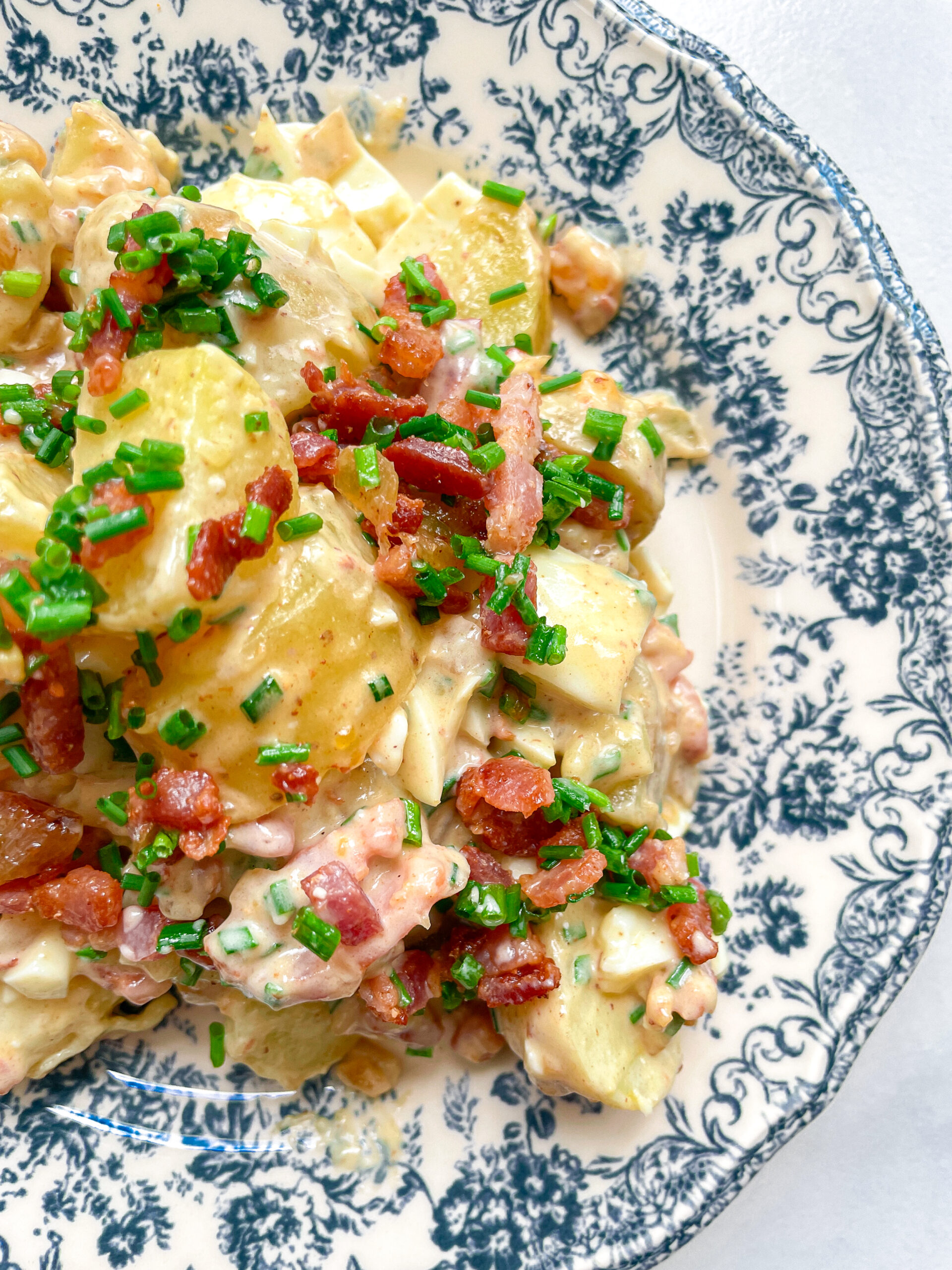 Potato Salad with Eggs Bacon Pickles & Caramalized Onions