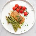 Cod with Caper Lemon Butter Baked Asparagus & Vine Tomatoes