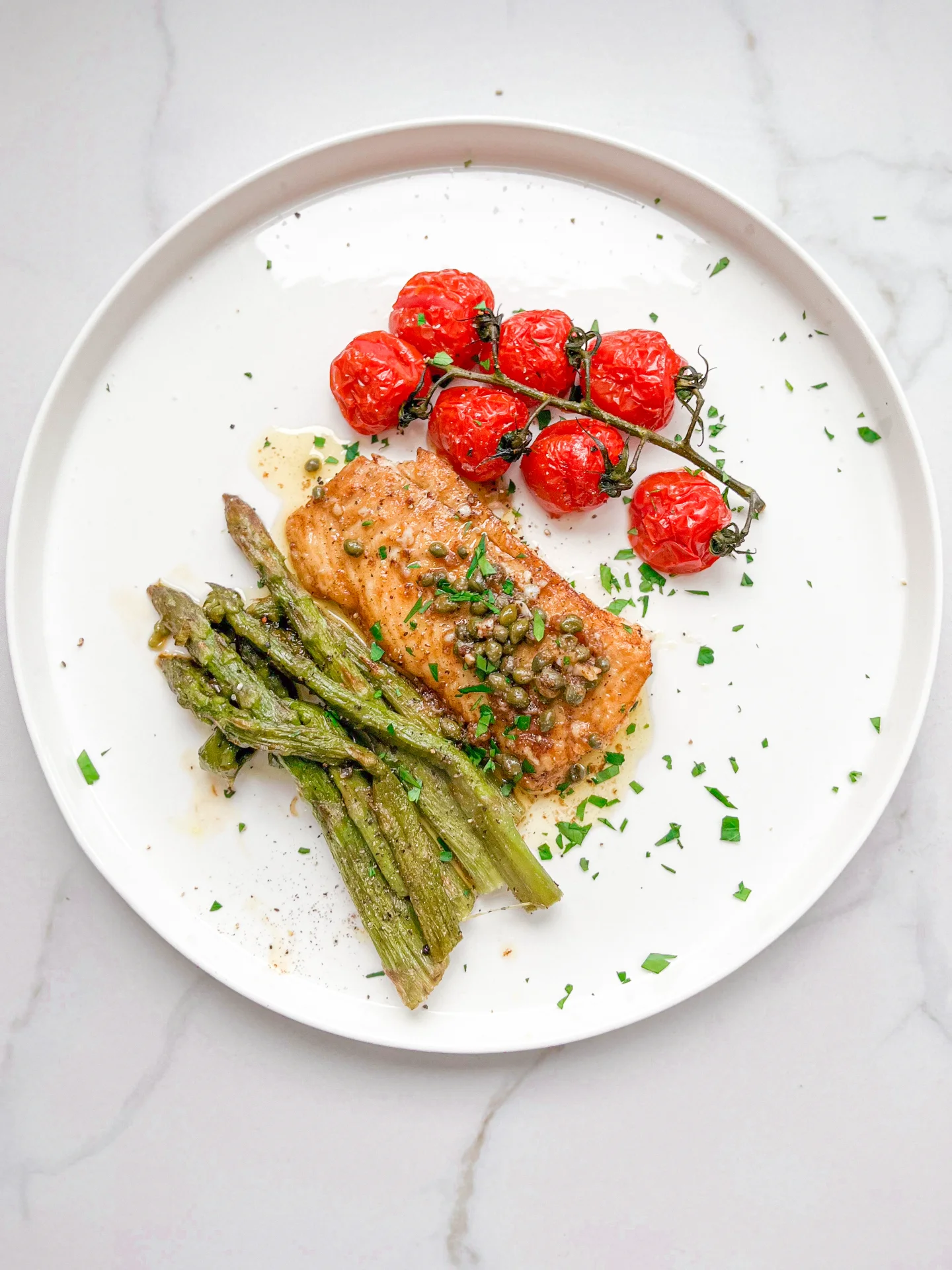 Cod with Caper Lemon Butter Baked Asparagus & Vine Tomatoes