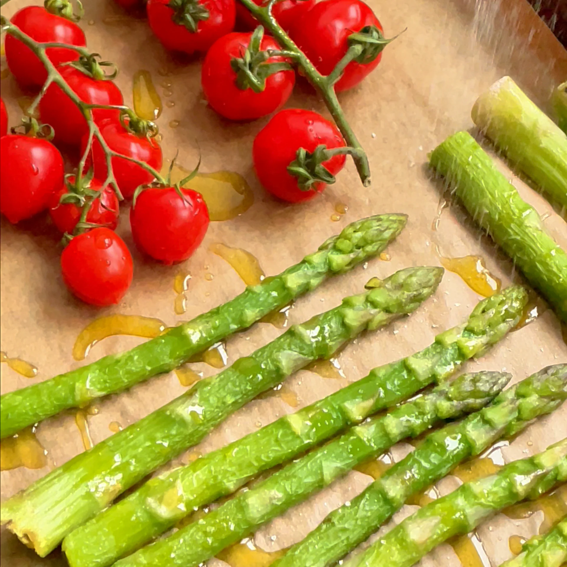 Cod with Caper Lemon Butter Baked Asparagus & Vine Tomatoes