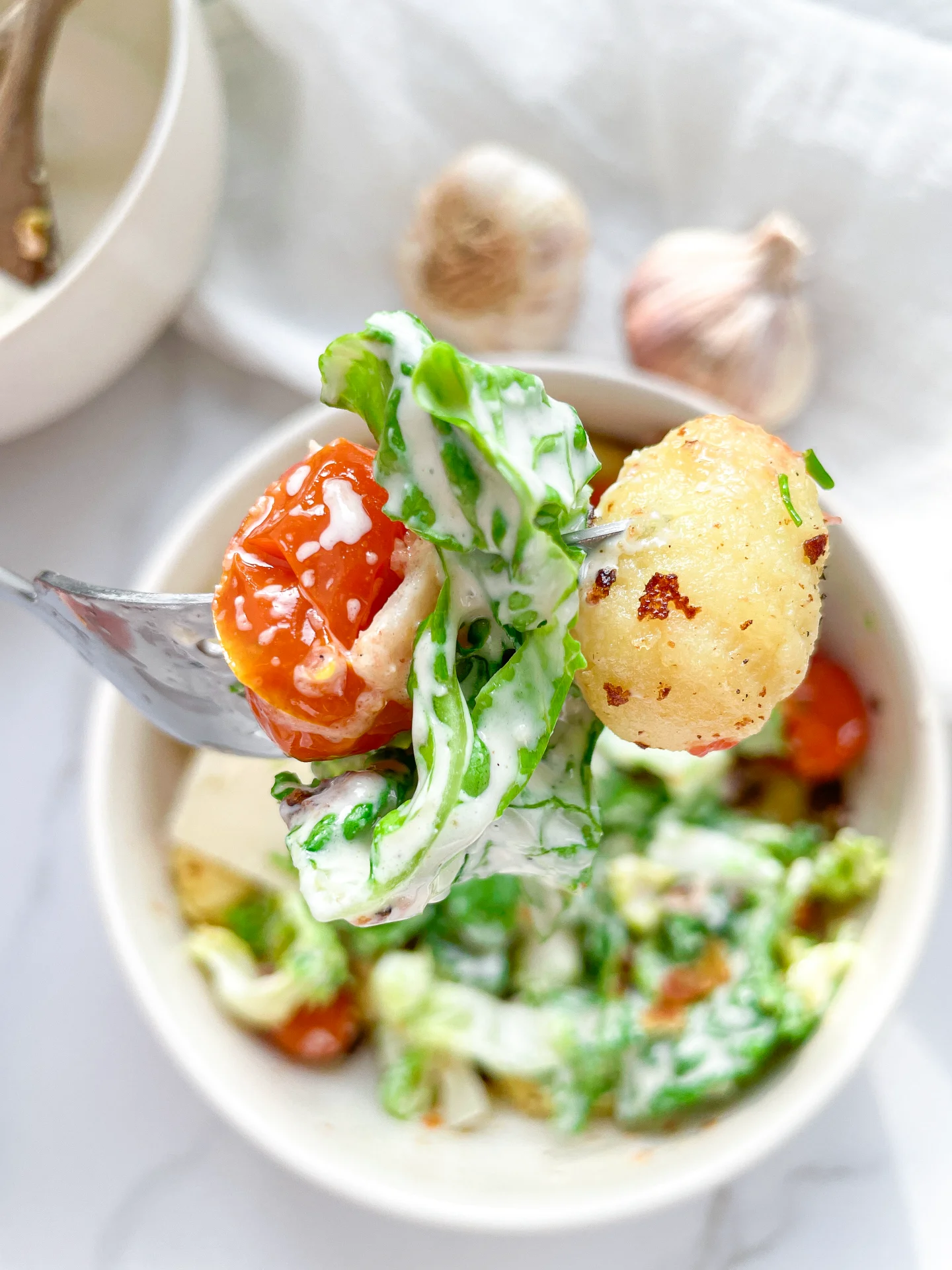 Gnocchi Romaine Salad with Oven-Roasted Tomatoes & Parmesan