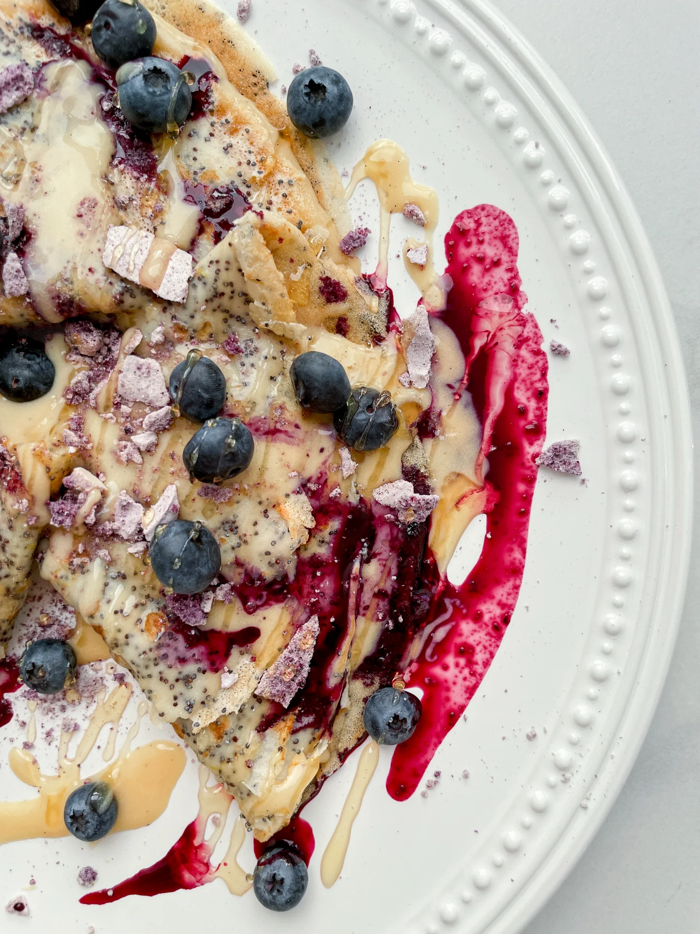 Poppyseed Crepe with Lemon Pastry Cream & Blueberry Meringue