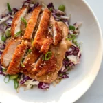 Crispy Chicken with Peanut Coconut Sauce & Edamame Slaw