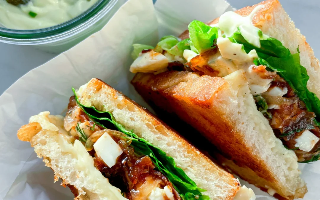 Crispy Sandwich with Egg Salad Spicy Bacon & Caramalized Onions