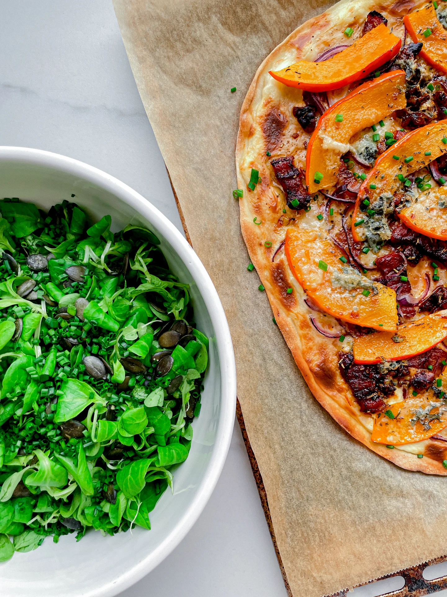 Pumpkin Tarte Flambée with Bacon Walnuts Gorgonzola & Lamb's Lettuce