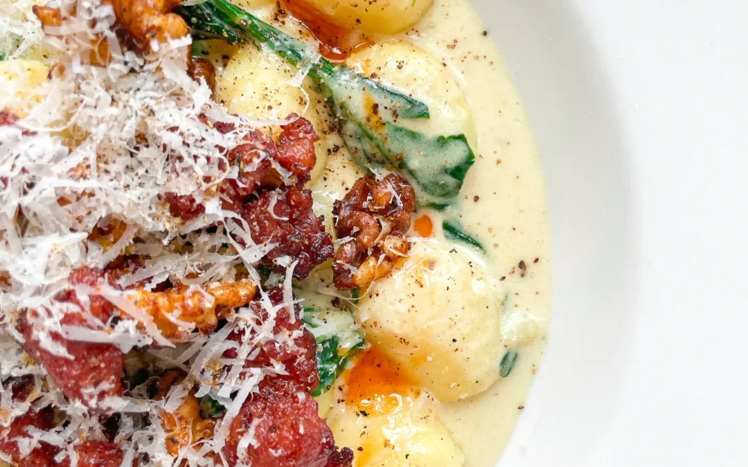 Gorgonzola Spinach Gnocchi with Salsiccia Walnut Topping