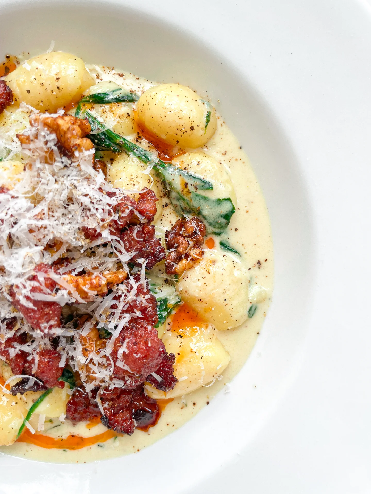 Gorgonzola Spinach Gnocchi with Salsiccia Walnut Topping