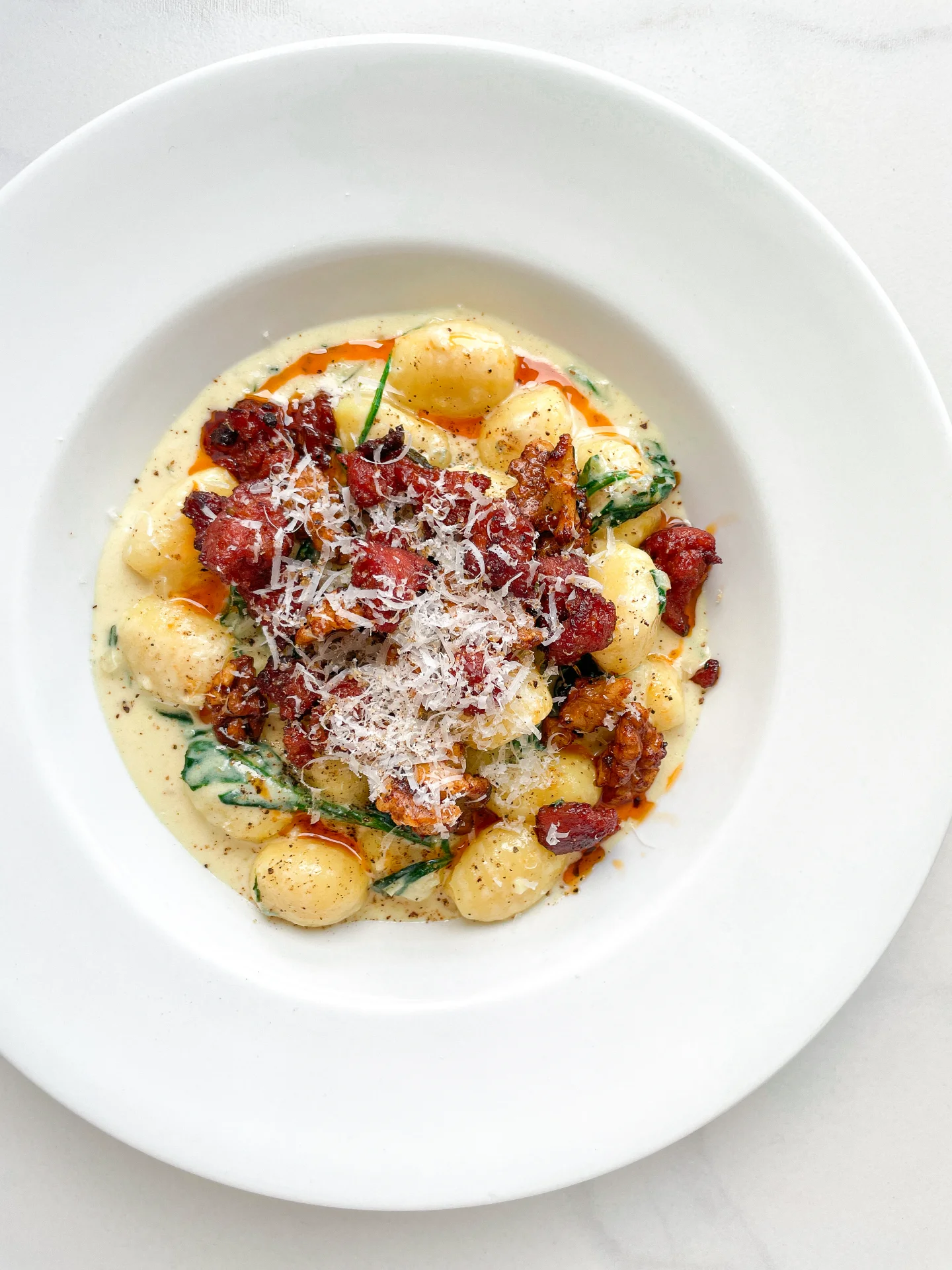 Gorgonzola Spinach Gnocchi with Salsiccia Walnut Topping