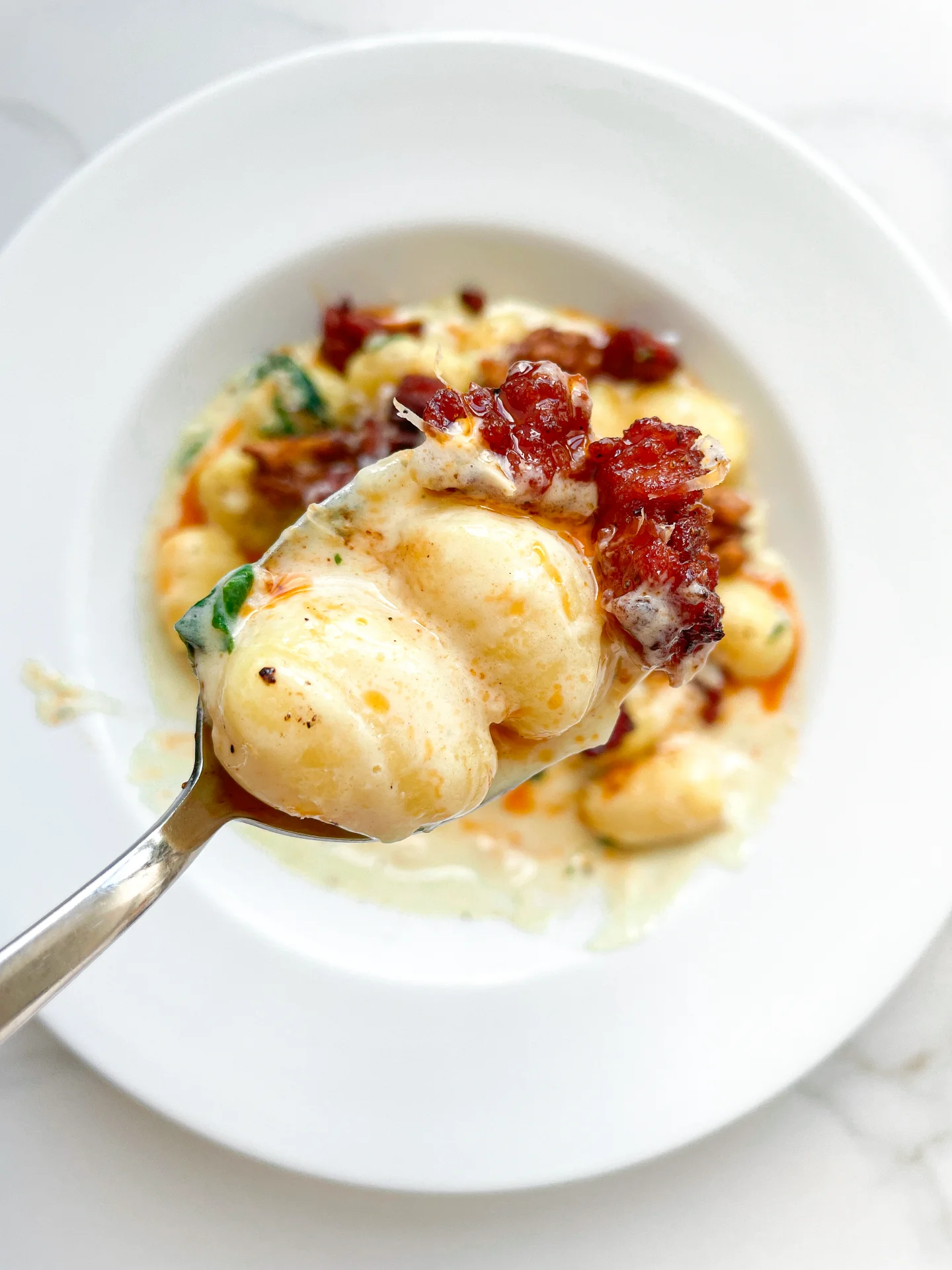 Gorgonzola Spinach Gnocchi with Salsiccia Walnut Topping