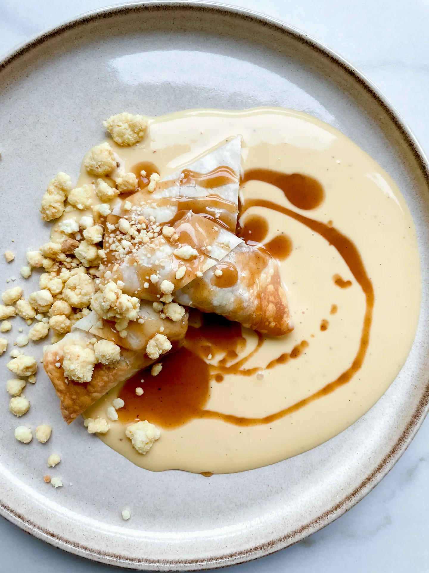 Apple Pie Rolls with Vanilla & Caramel Sauce & Milk Crumble